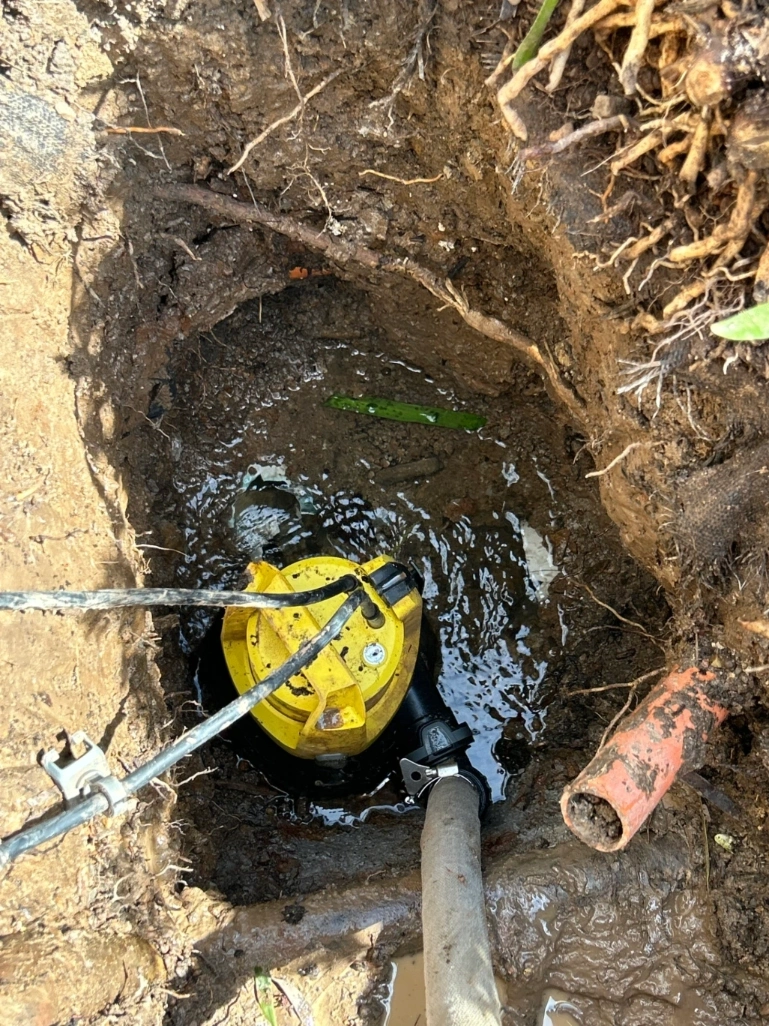 Draining water from stormwater pit