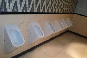 row of urinals for commercial properties