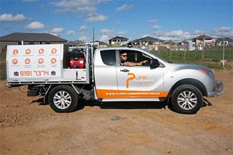 Pure Plumbing Professionals van and emergency plumber