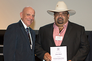 Dennis Mutton with individual award winner, Aaron Stuart