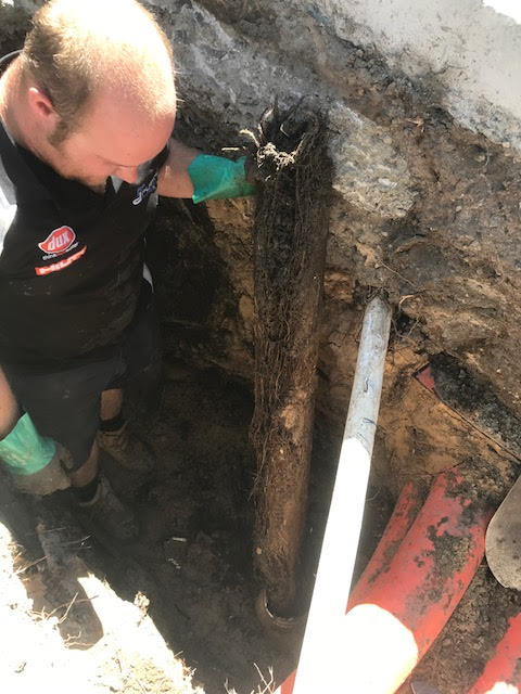 Clearing a blocked drain Clearing a blocked drain
