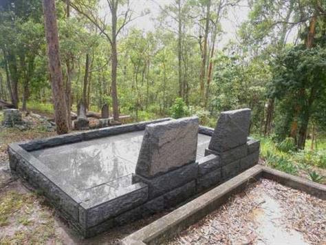 Restored gravestone - behind