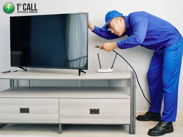 Electrician installing TV