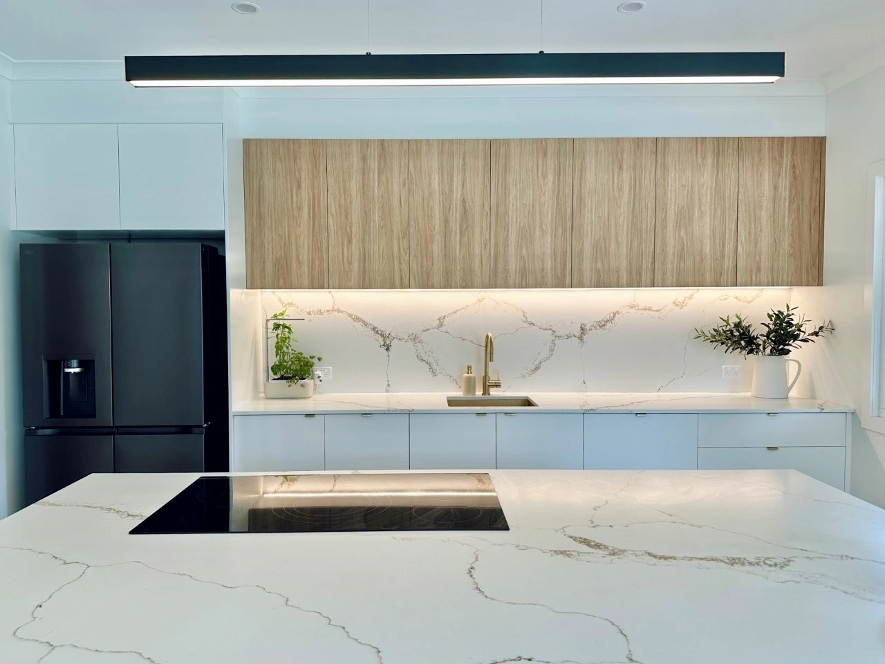 Polytec’s ‘Prime Oak’ in Steccawood overhead cabinetry in Haddon Kitchens Project