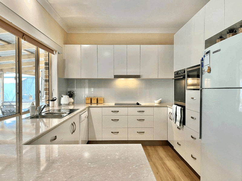Polytec kitchen cabinetry in 'Blossom White'