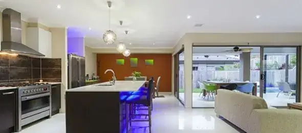 kitchen with outdoor area and efficient lighting over kitchen bench