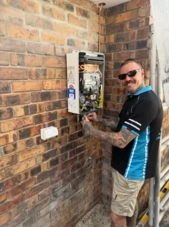 Blake upgrading the Rinnai hot water system