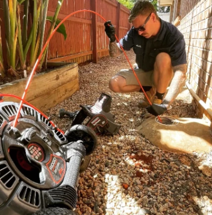 Our plumber inspecting a blocked drain