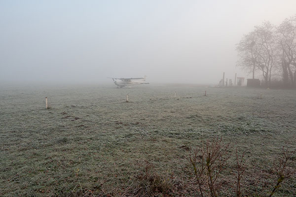 Plane In Fog