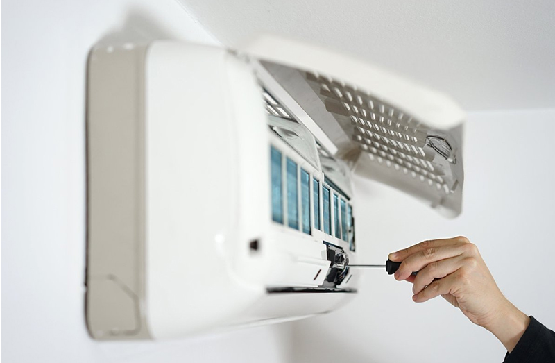 Air Conditioner Maintenance Service being performed