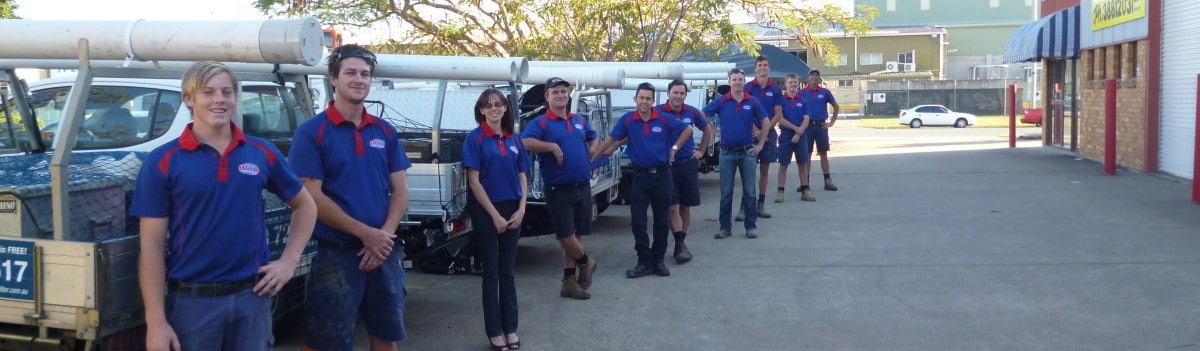 Express Wastewater Septic Tank Team stood with branded utes