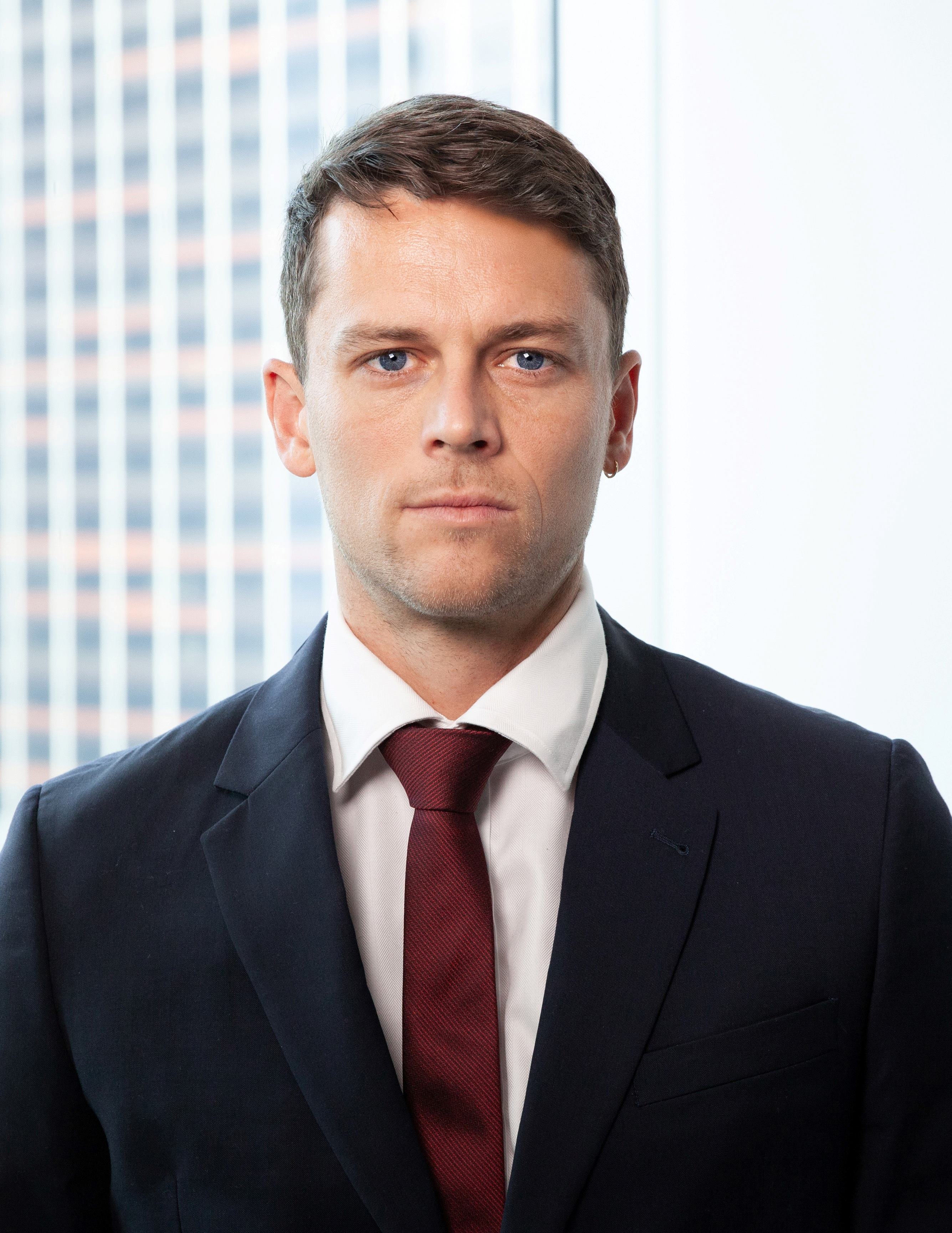 Tom Clelland, LLB, LLM, DipLang (French), C1 DALF