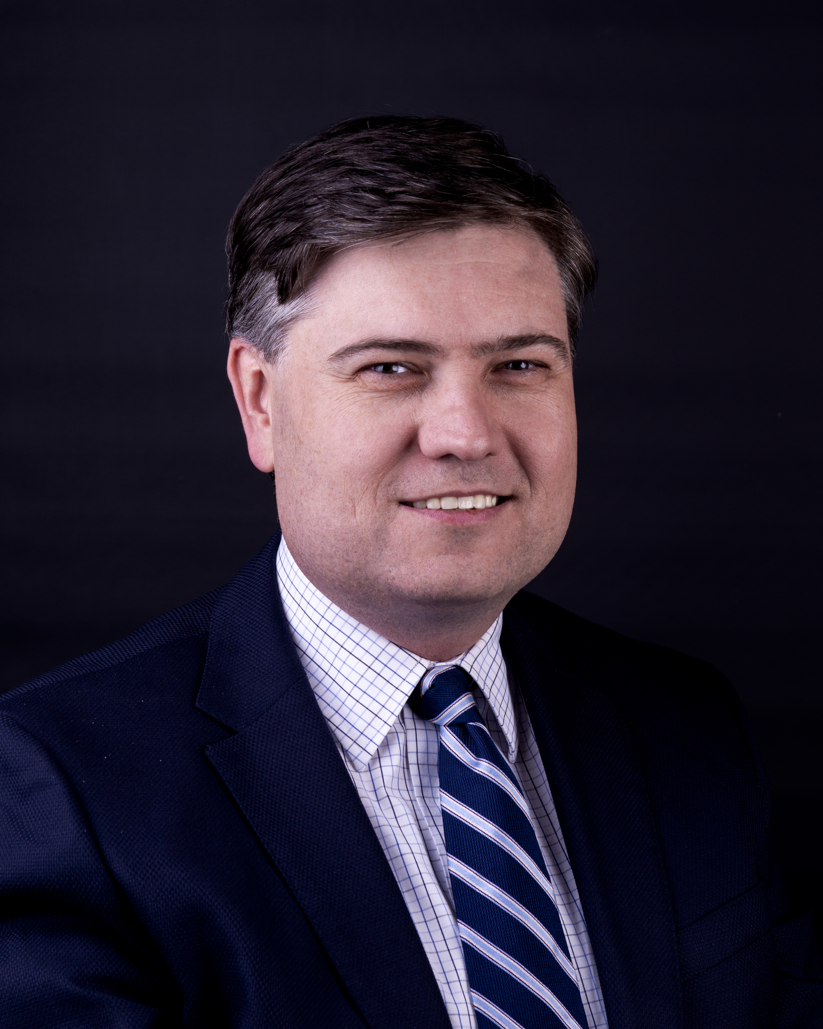 John (Jack) Tracey, B.A. (Hons), LL.B. (Melb) 