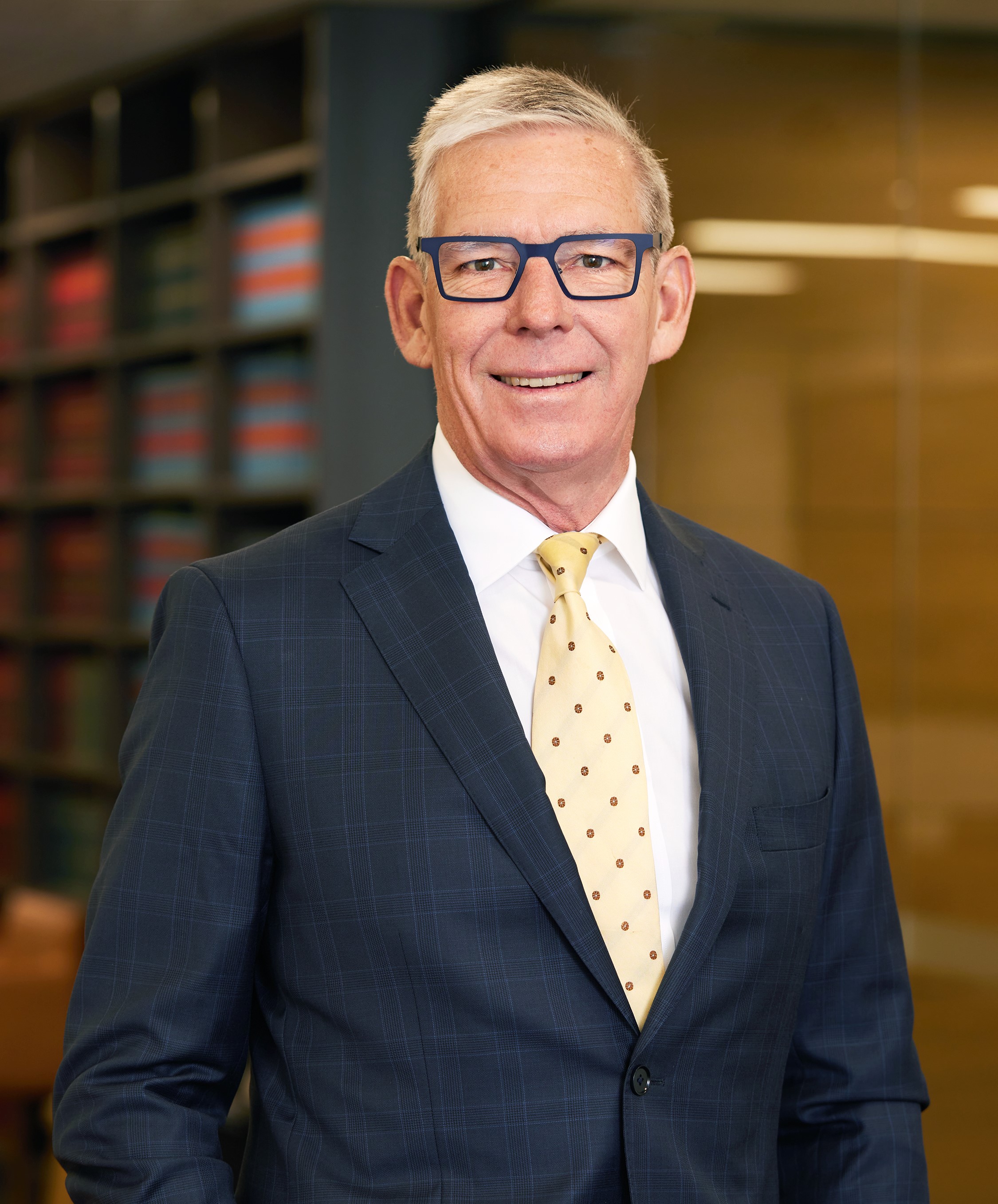 James  Mighell, B.Comm, LL.B 
