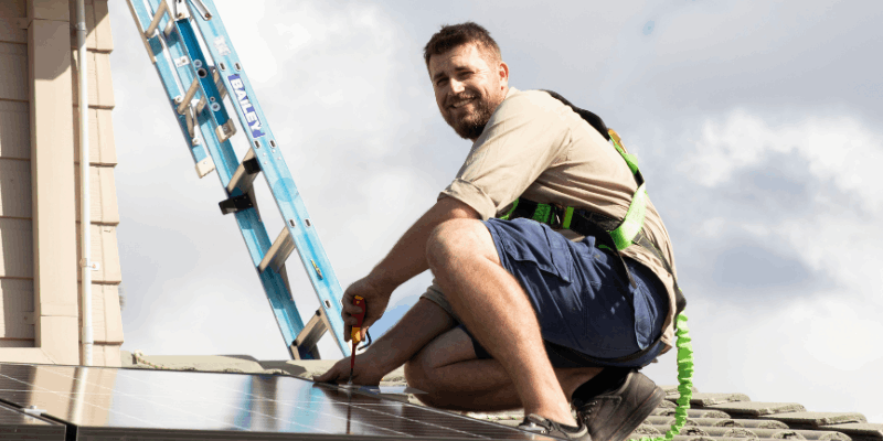 Fallon Solutions Solar Technician Installing Solar Panels & Interverts