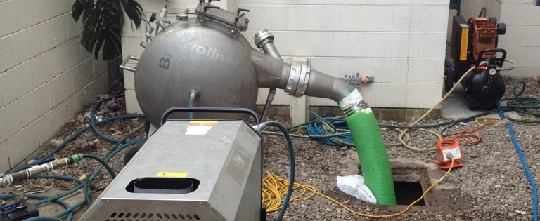 Brawoliner Pipe relining machine inserted into drain access hole and pipe from machine inserts new pipe lining into broken pipe to deliver no dig pipe relining