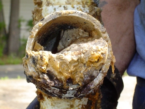 Drain pipe blocked with grease, fats and foreign objects