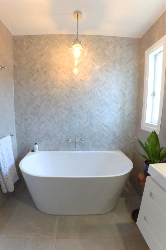 Herringbone tiling in bathroom renovation