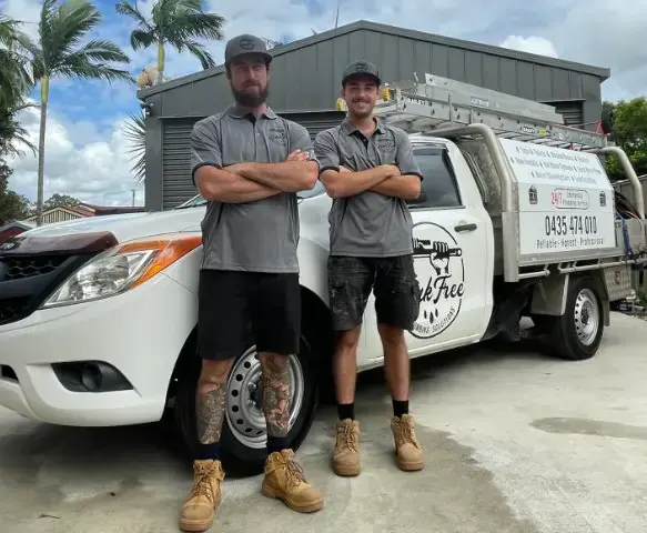 Leak Free Plumbers next to work van