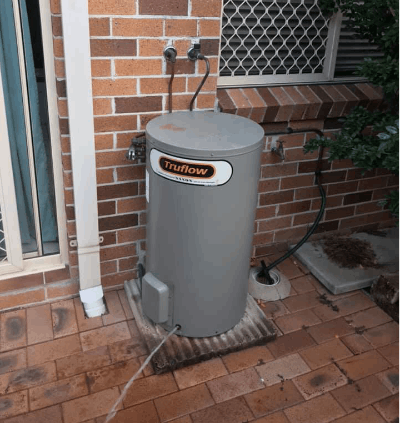 old storage tank hot water system