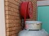 Another angle of the fire hose reel in photo 35.  If the gas cylinder was on fire, what would you do?