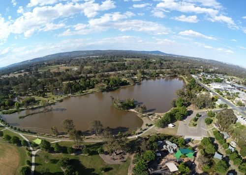 The bustling cityscape of Albury-Wodonga, captured where the urban meets the natural, highlighting its cultural vibrancy, historical buildings, and the picturesque settings along the state border.