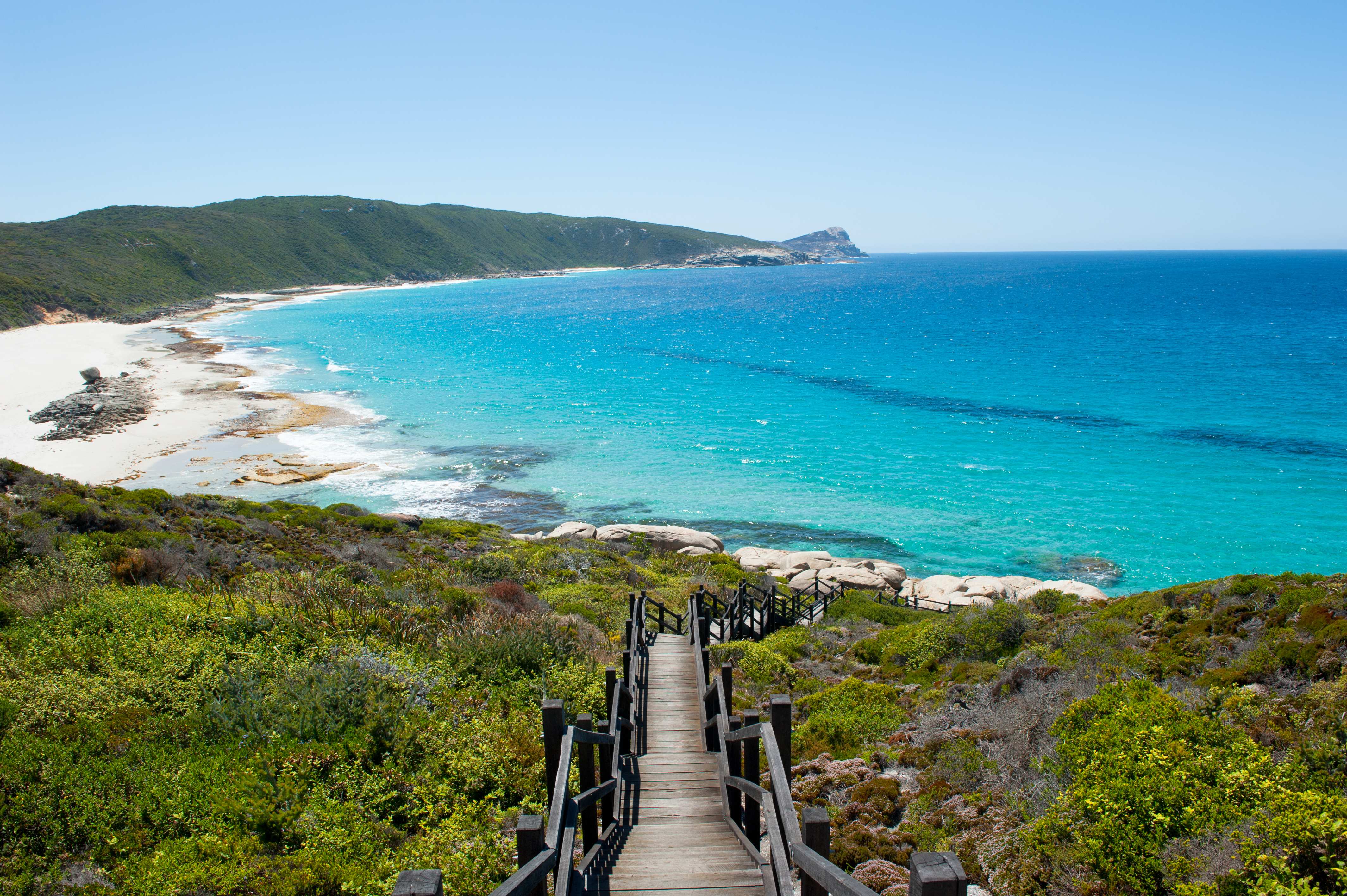 A serene scene from Cable Beach, highlighting its expansive coastline and golden sands. 