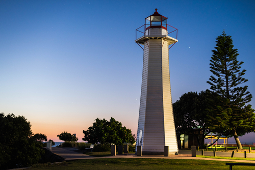 The iconic Cleveland Point Lighthouse, with its distinctive red and white stripes, stands as a historic beacon in Moreton Bay. A symbol of maritime heritage, this picturesque lighthouse offers breathtaking sunset views and serves as a serene spot for visitors to experience the beauty of the Redlands coast.