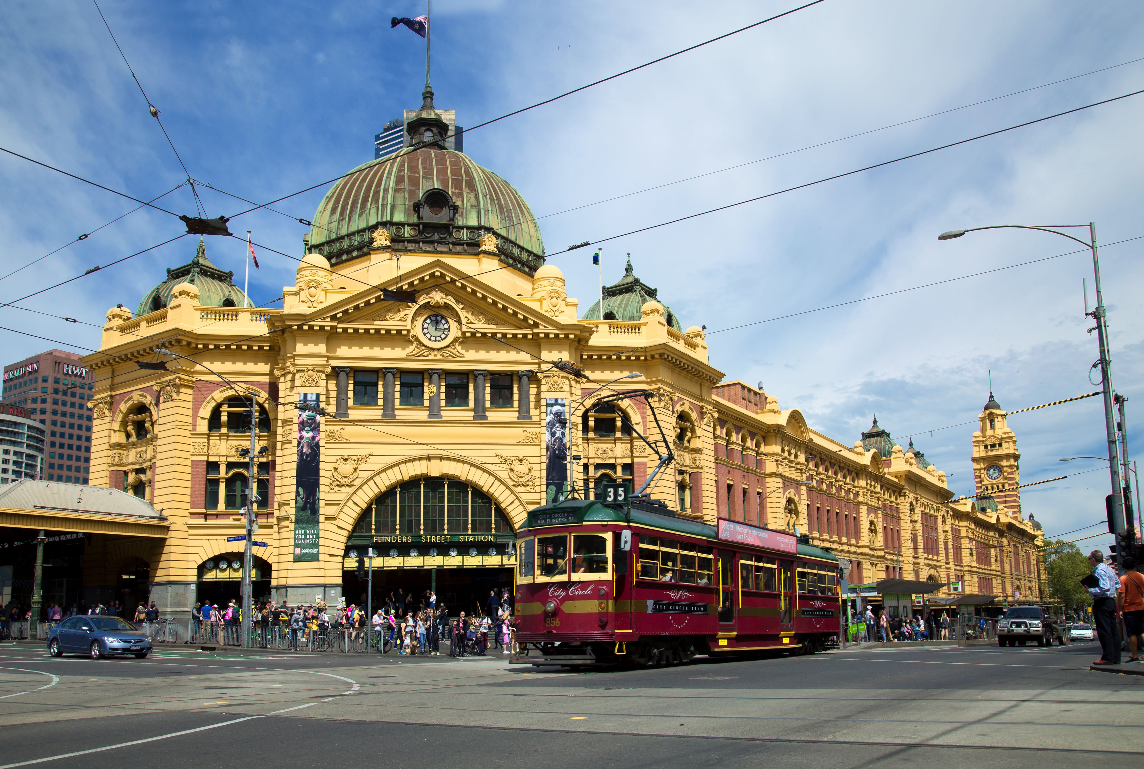 Flinders Street Station against Melbourne's cityscape. 