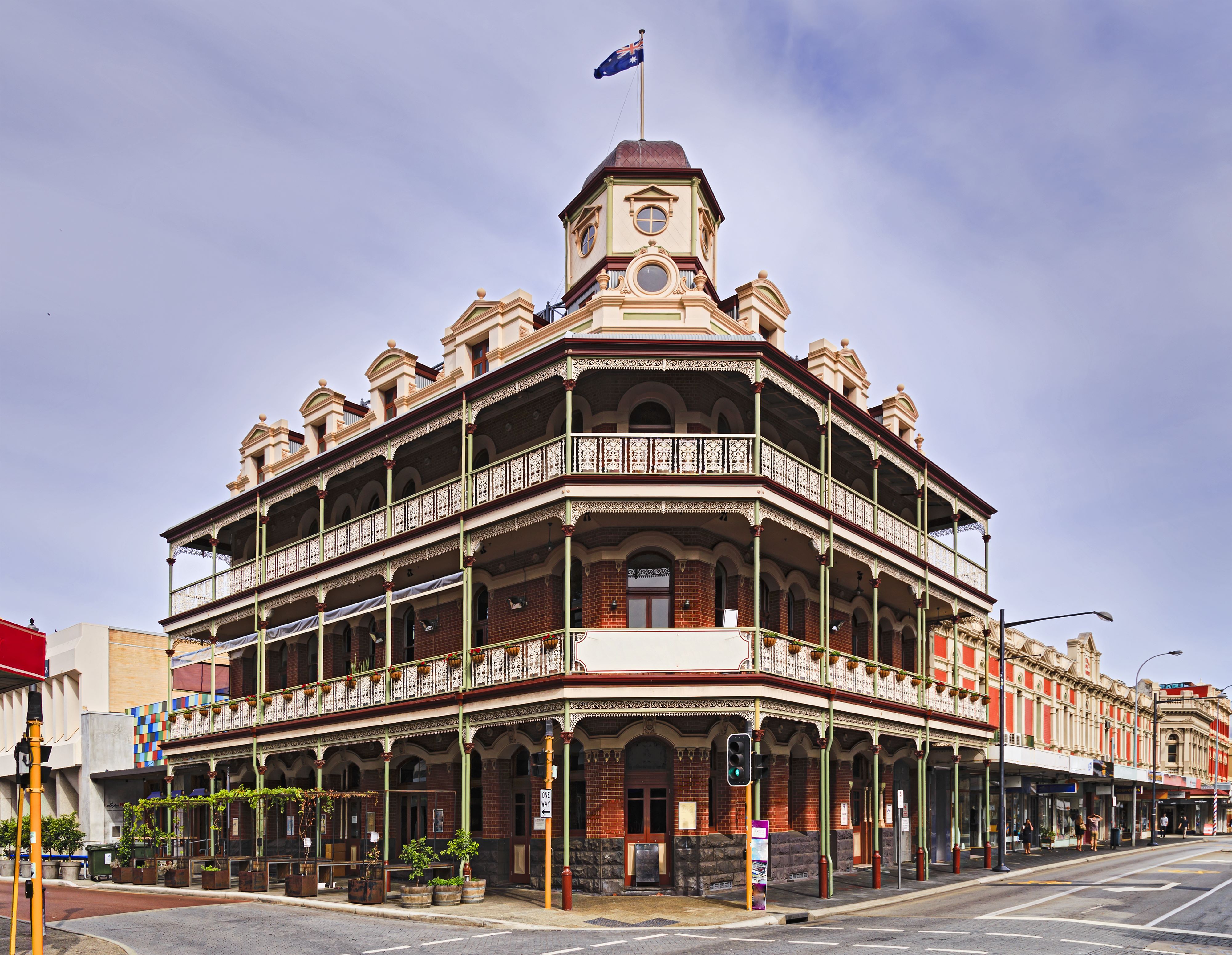 A charming scene from Fremantle, showcasing historic architecture and a lively market atmosphere.
