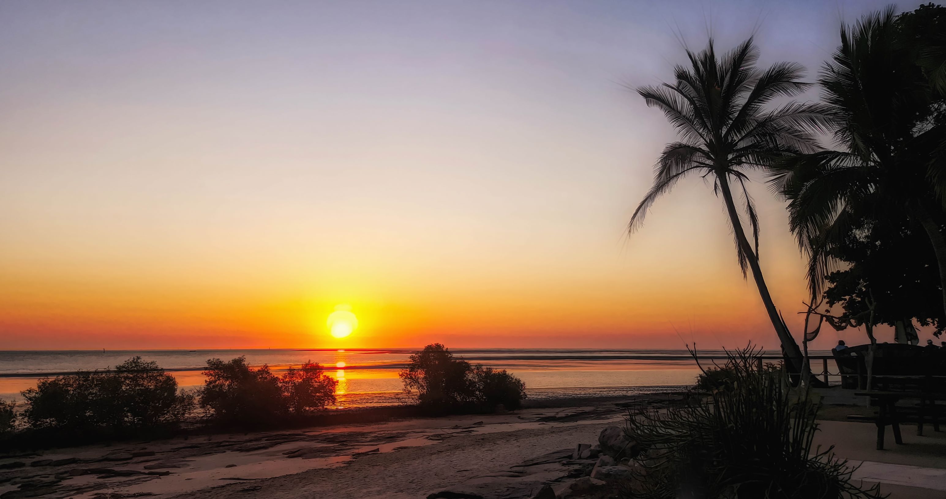 A captivating image of the sunset in Karumba, highlighting the vibrant colors reflecting on the Gulf of Carpentaria. 