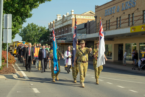 The unique charm of Leeton, highlighted by its distinctive Art Deco buildings and wide, tree-lined streets, set against the backdrop of the productive fields of the Murrumbidgee Irrigation Area, embodying its role as a key agricultural centre.
