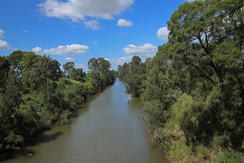 Serene view of Logan River at sunset, showcasing the natural beauty and tranquil waters that flow through Logan, Queensland. Perfect for outdoor activities and nature enthusiasts exploring Australia's scenic landscapes.