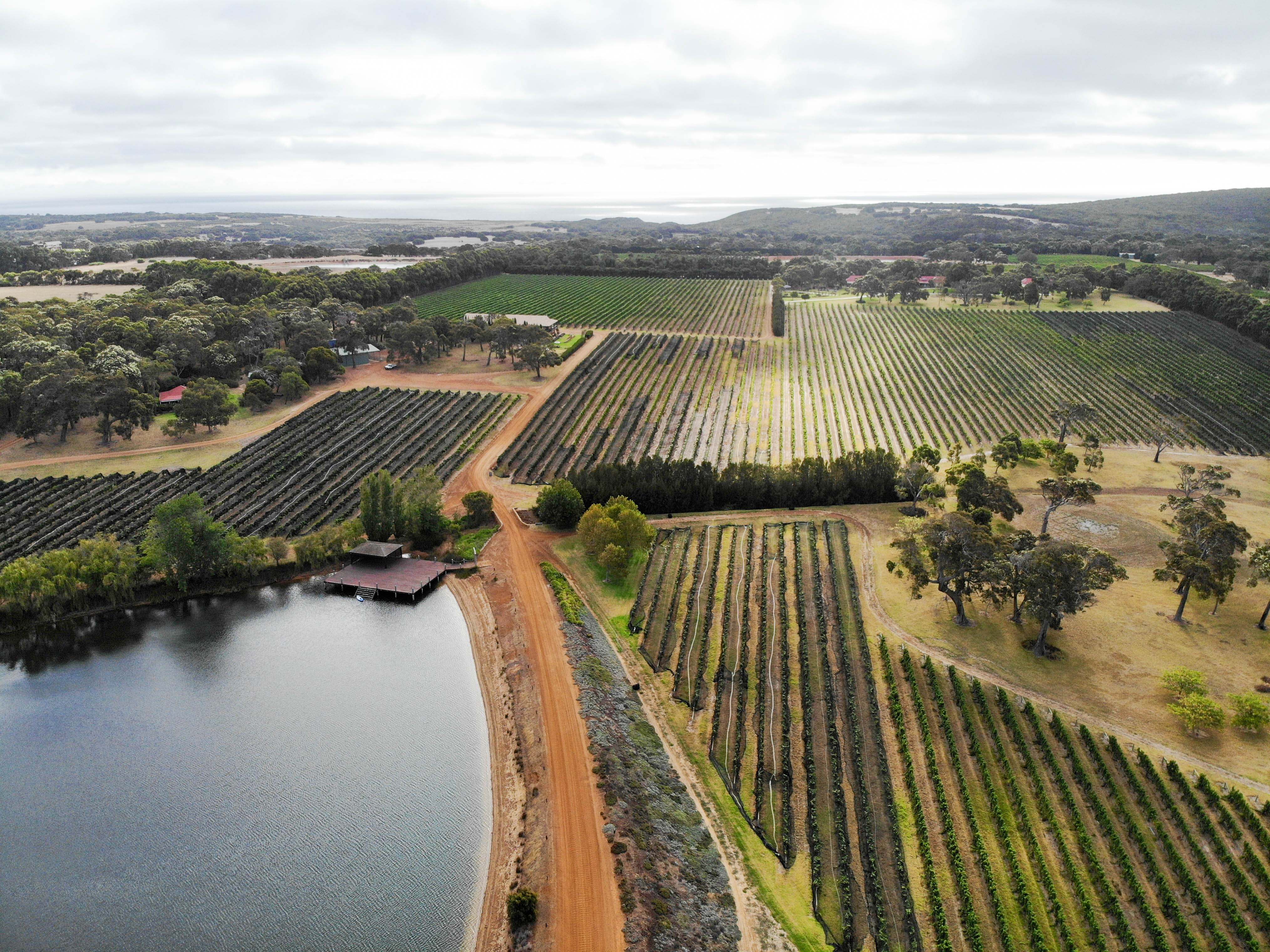 The picturesque vineyards of Margaret River and the rugged coastline.