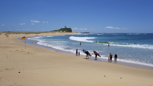 Discover the serene beauty of Nobby's Beach in Newcastle, a pristine stretch of sand offering breathtaking ocean views and a haven for surfers and sun-seekers alike. A perfect spot for families and adventurers to create unforgettable memories.