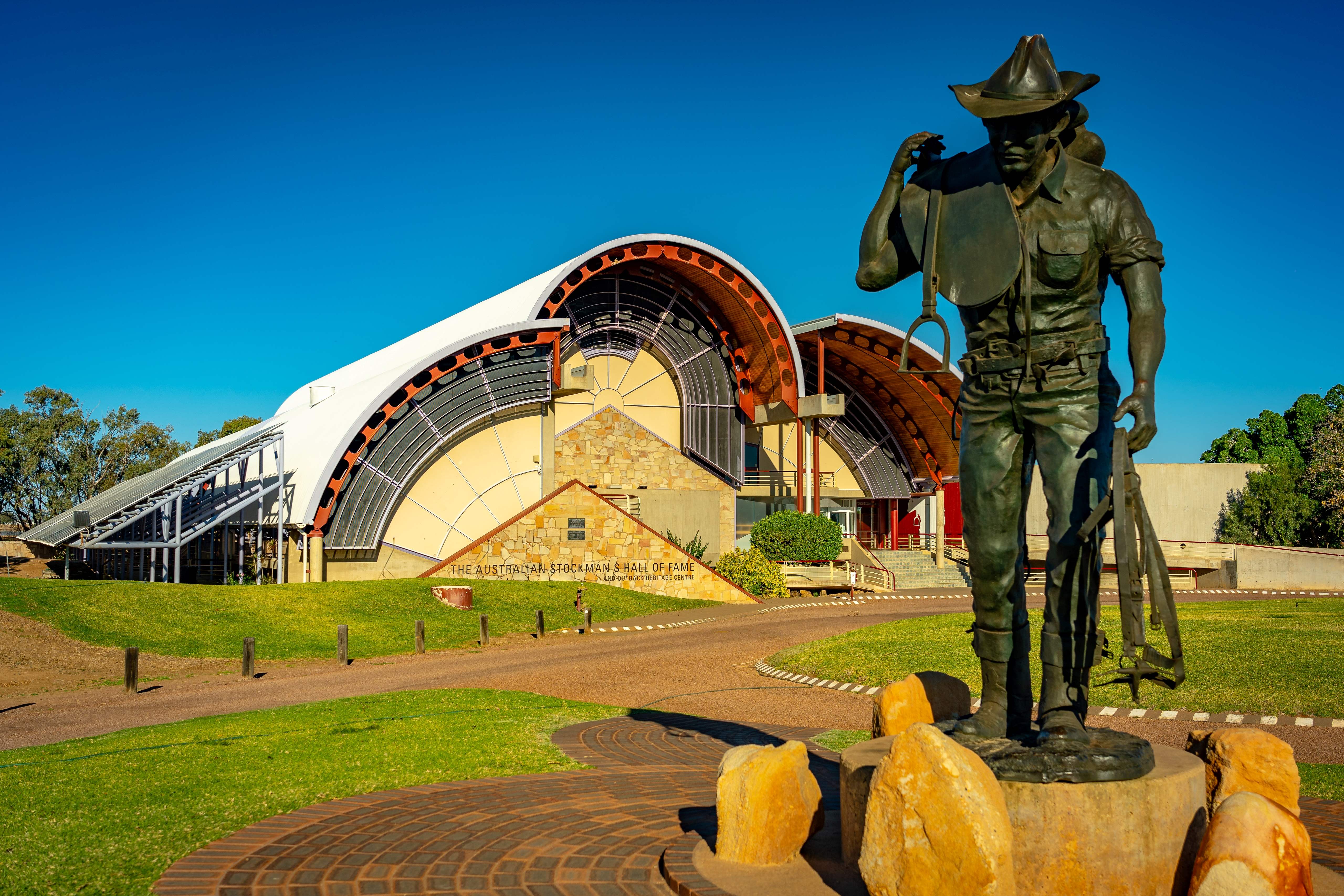 A photo of the Stockman's Hall of Fame, displaying its unique architecture and featuring exhibits highlighting the outback lifestyle. 