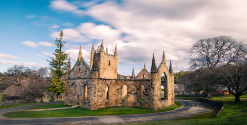 The haunting yet serene landscape of Port Arthur, showcasing the well-preserved ruins of the penal colony, a poignant reminder of Tasmania's convict past.