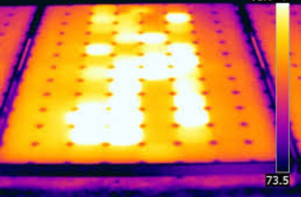 Thermal image of hot spots on a solar panel