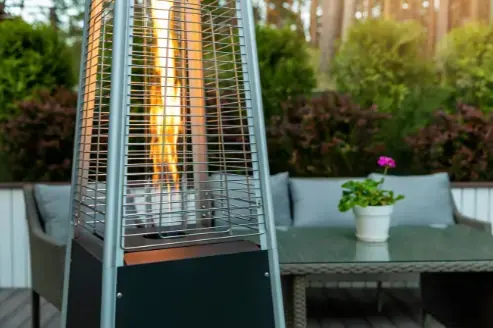 outdoor gas heater in a garden setting