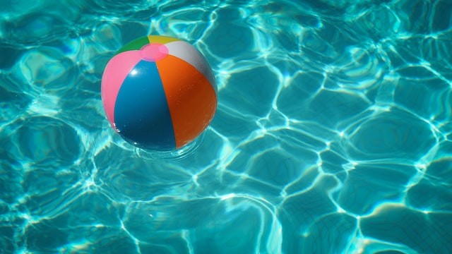 Pool water with beachball