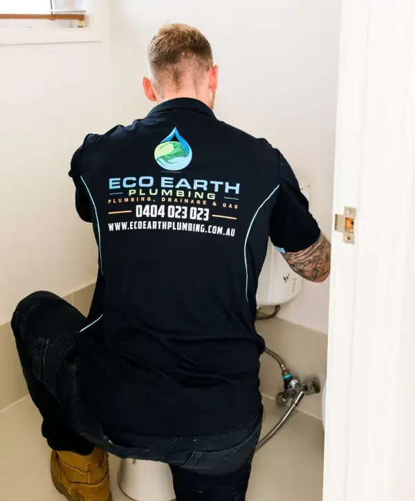 Eco Earth plumber fixing toilet