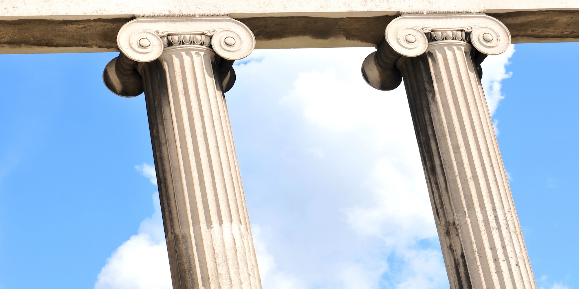 2 Pillars against blue sky