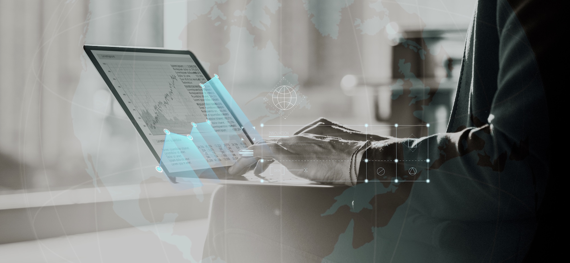 Man on computer with global map overlay