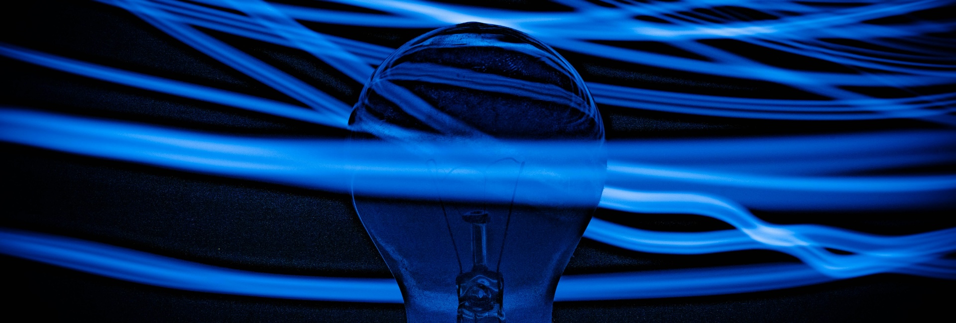Blue lightbulb representing innovation and research and development for Australia’s R&D Tax Incentive reforms.