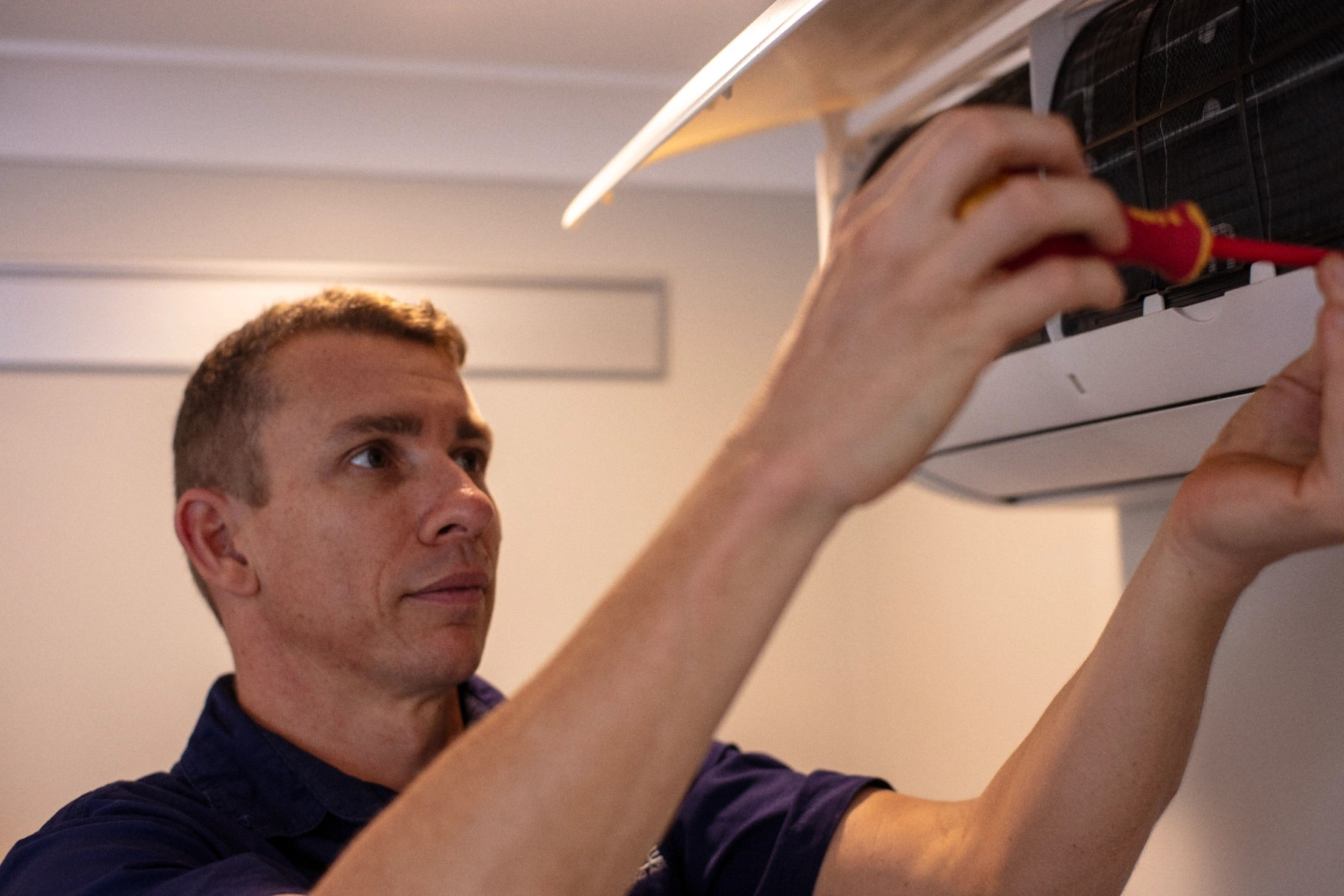 Chris installing an air conditioner for south brisbane home