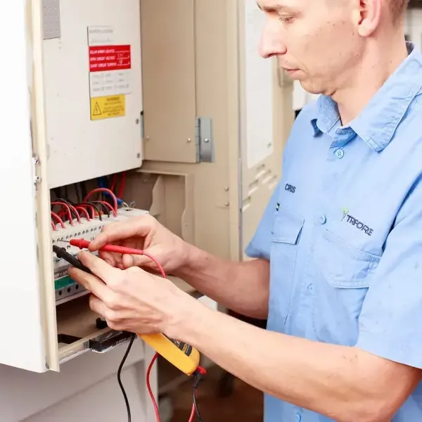 Chris working on a switchboard