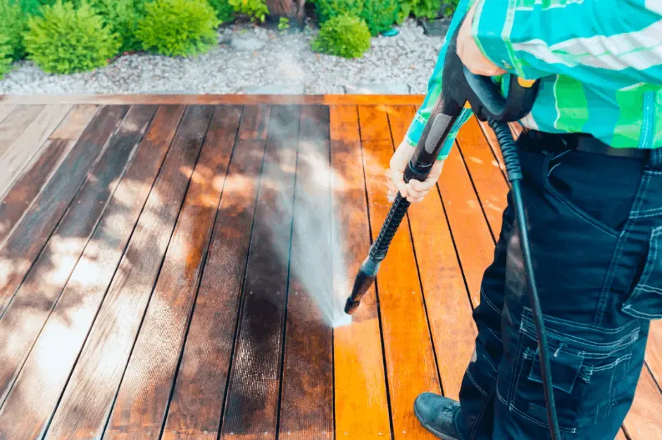 Pressure washing timber decking - dirty and grimey before and clean after