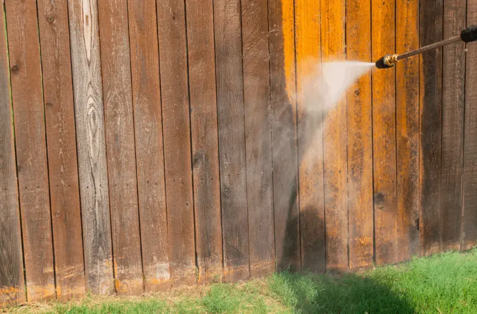 Pressure washing timber fence - dirt & grime before and like-new after