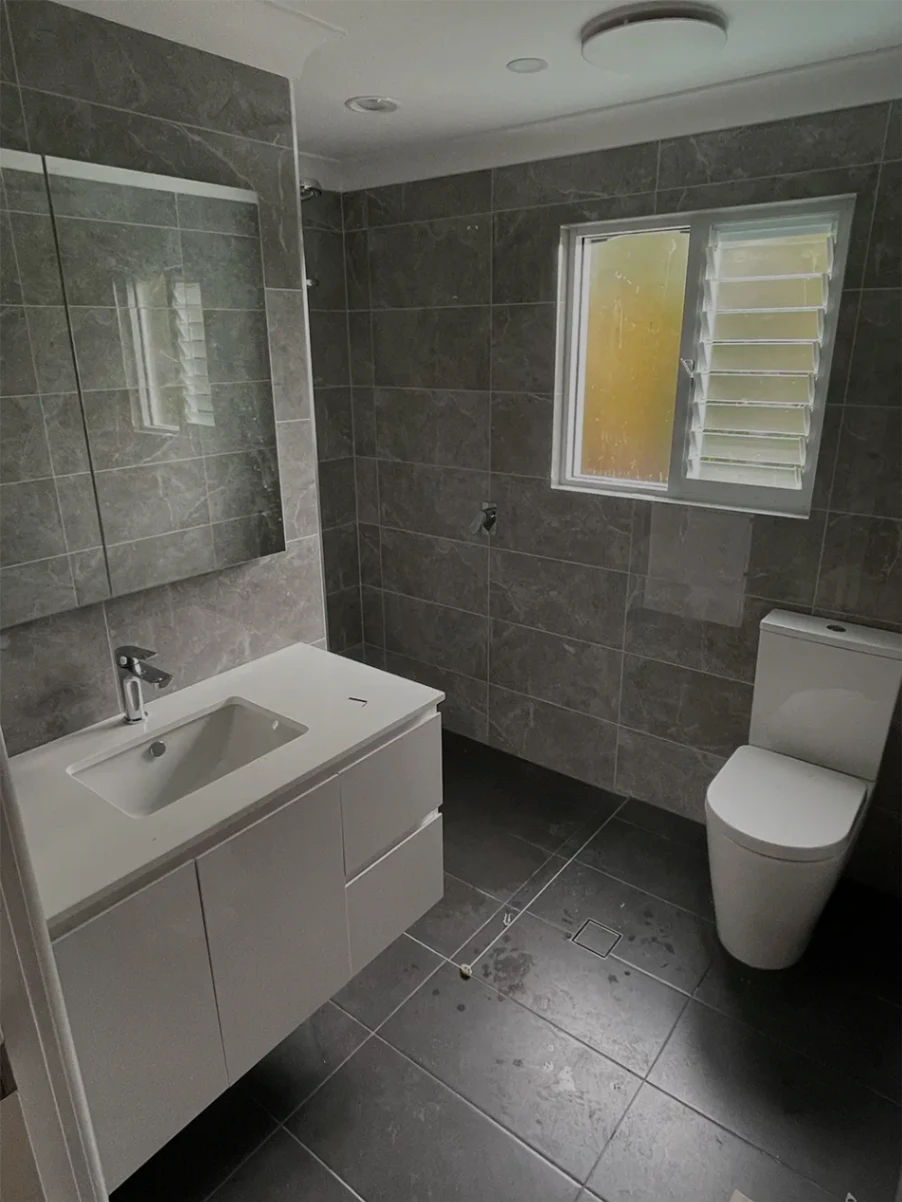 modern bathroom with toilet and sink