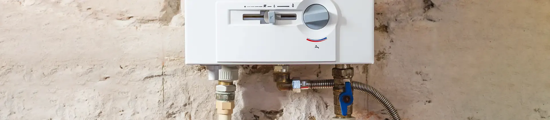 gas hot water system installed on an outside wall having been thoroughly serviced to ensure optimal performance